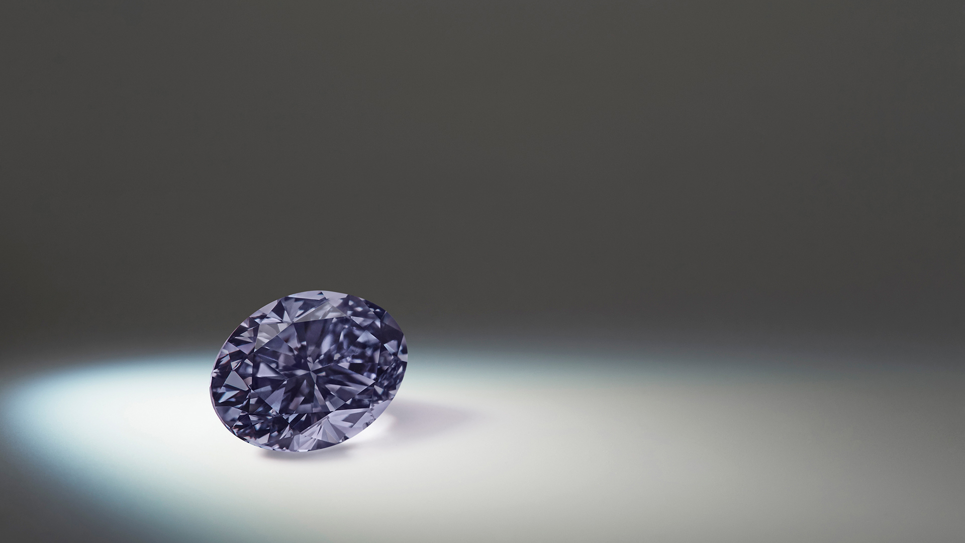 Argyle Infinité ™, a 0.70ct pear shaped Fancy Dark Violet-Gray diamond from the 2020 APD Tender. 