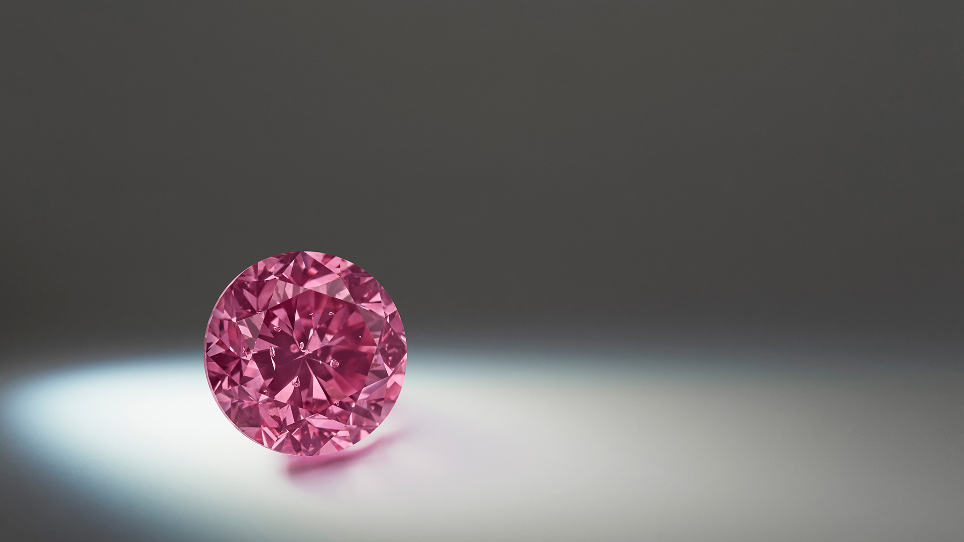 Argyle Eternity™, a 2.24ct round shaped Fancy Vivid Purplish Pink diamond from the 2020 APD Tender