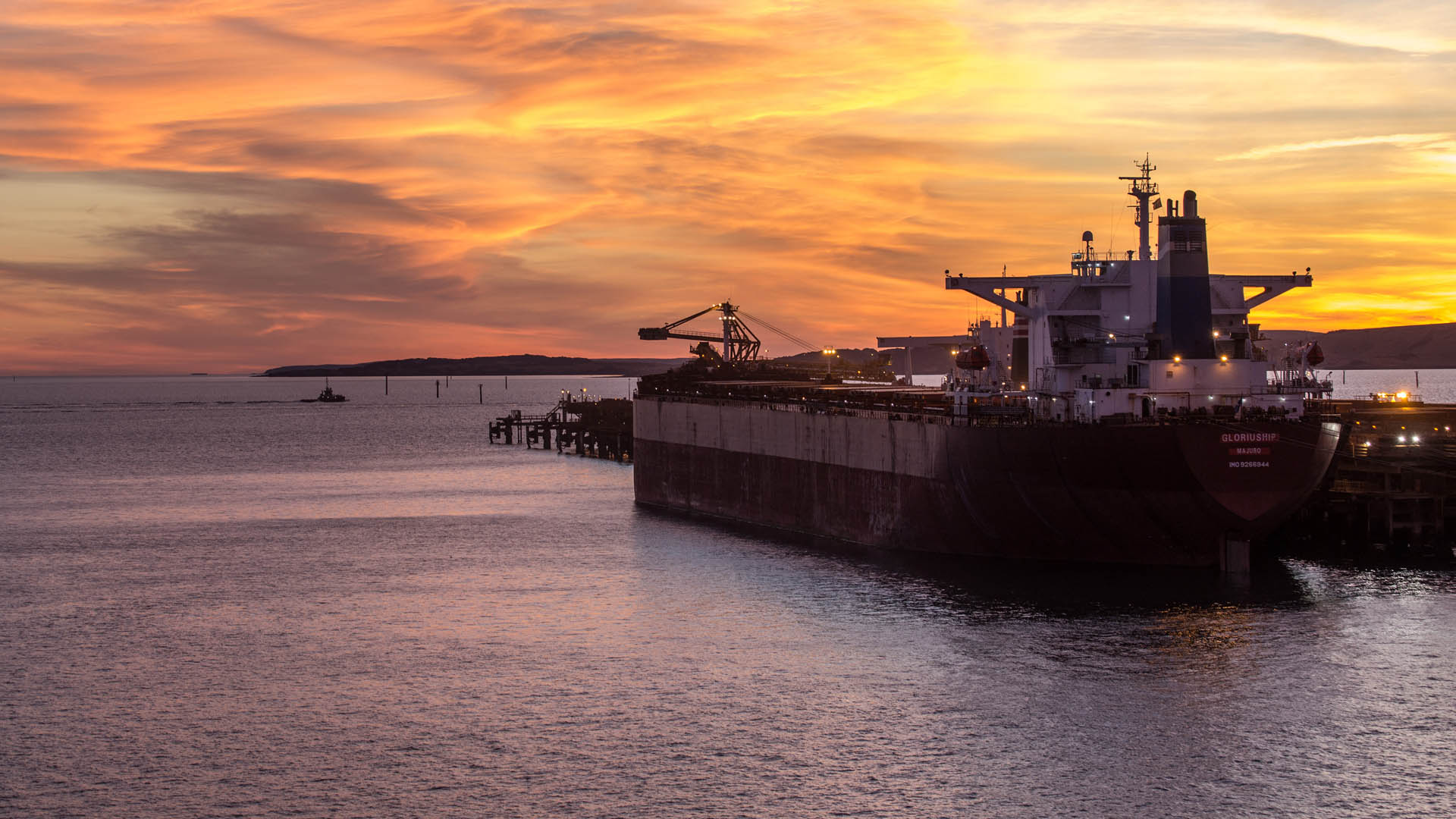 Ship at Dampier port at sunset