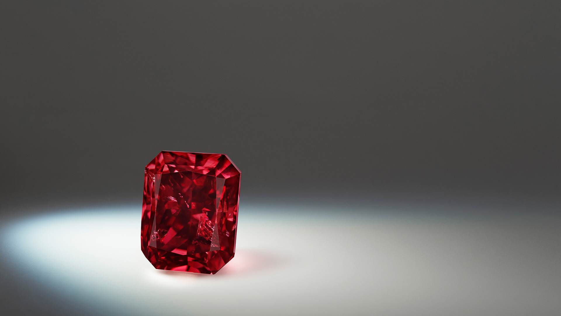 Lot 5, Argyle Bohème ™ a 1.01 carat, Fancy Red, radiant diamond