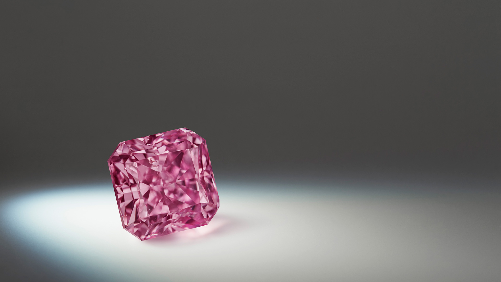 Lot 2, Argyle Stella™ a 1.79 carat, Fancy Vivid Purplish Pink, square radiant diamond