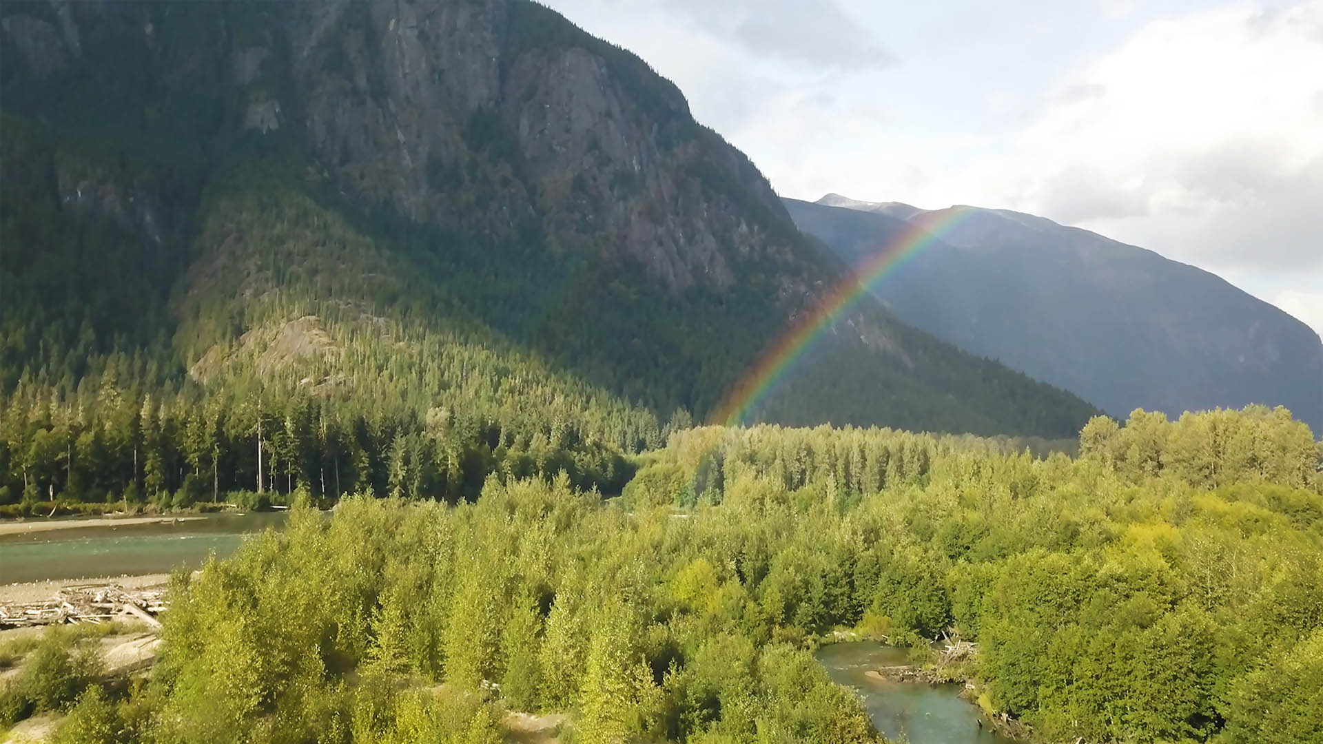 Rainbow in mountains, Canada
