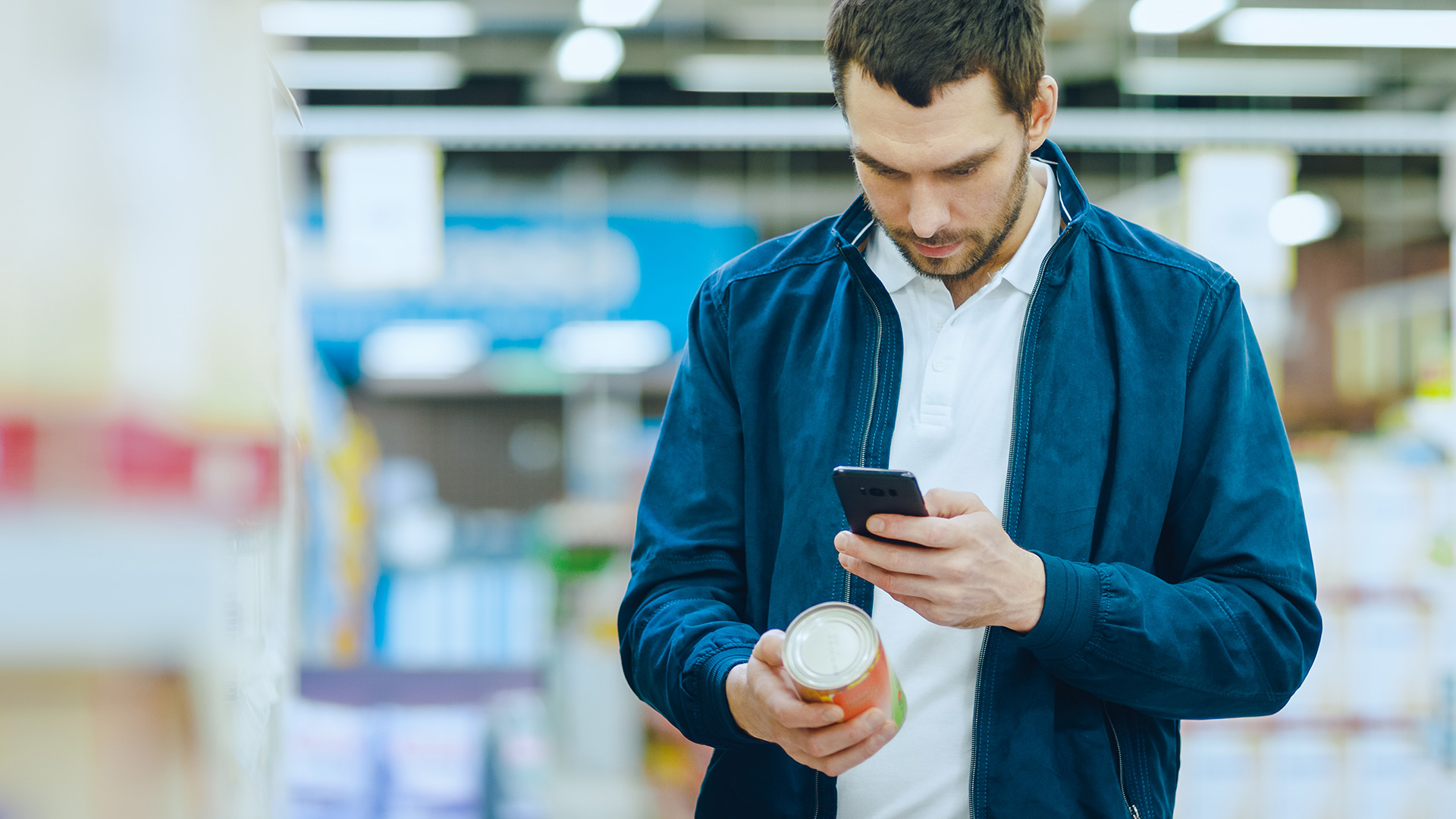 Man checking a can on the phone